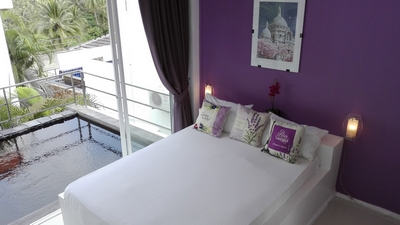 Sacre Coeur room in front of the pool and with the view of the sea at the bottom in the Villa Paris.